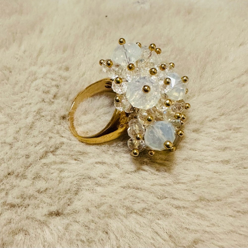 Beautiful Woman’s ring, with transparent shiny stones.